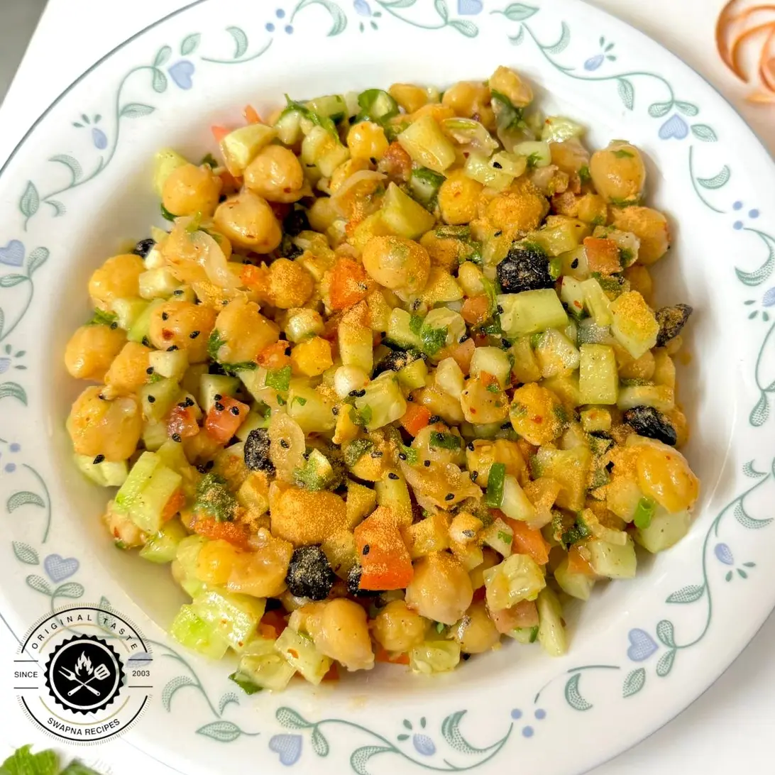 Nutritious Chana Salad with Fresh Veggies Protein-rich chana salad with fresh veggies, herbs, and lemon dressing — a healthy and filling vegetarian dish.