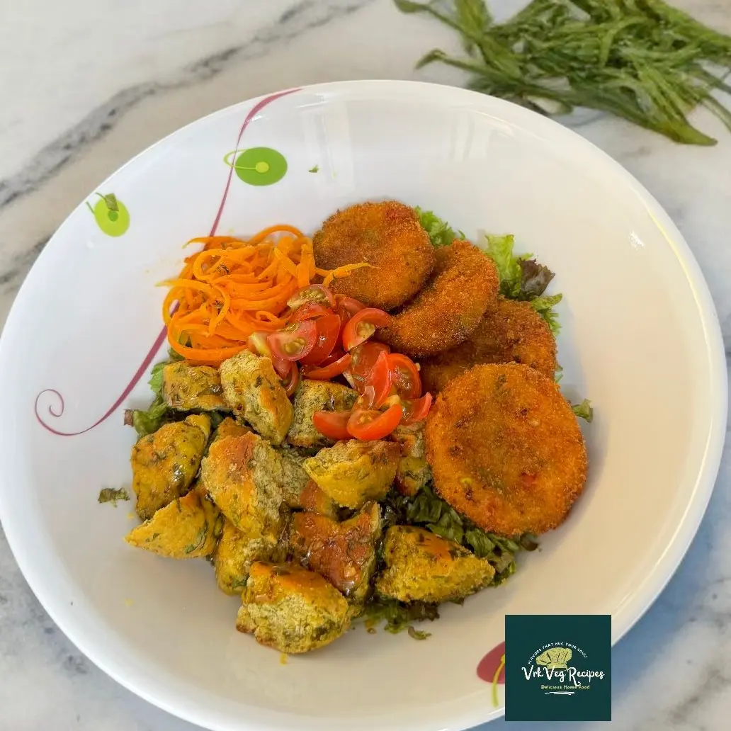 Healthy Golden Paneer Veg Cutlet Salad Recipe Colorful Golden Paneer Veg Cutlet Salad topped with chickpea coriander bagels and seasoned with red chili and black pepper flakes.