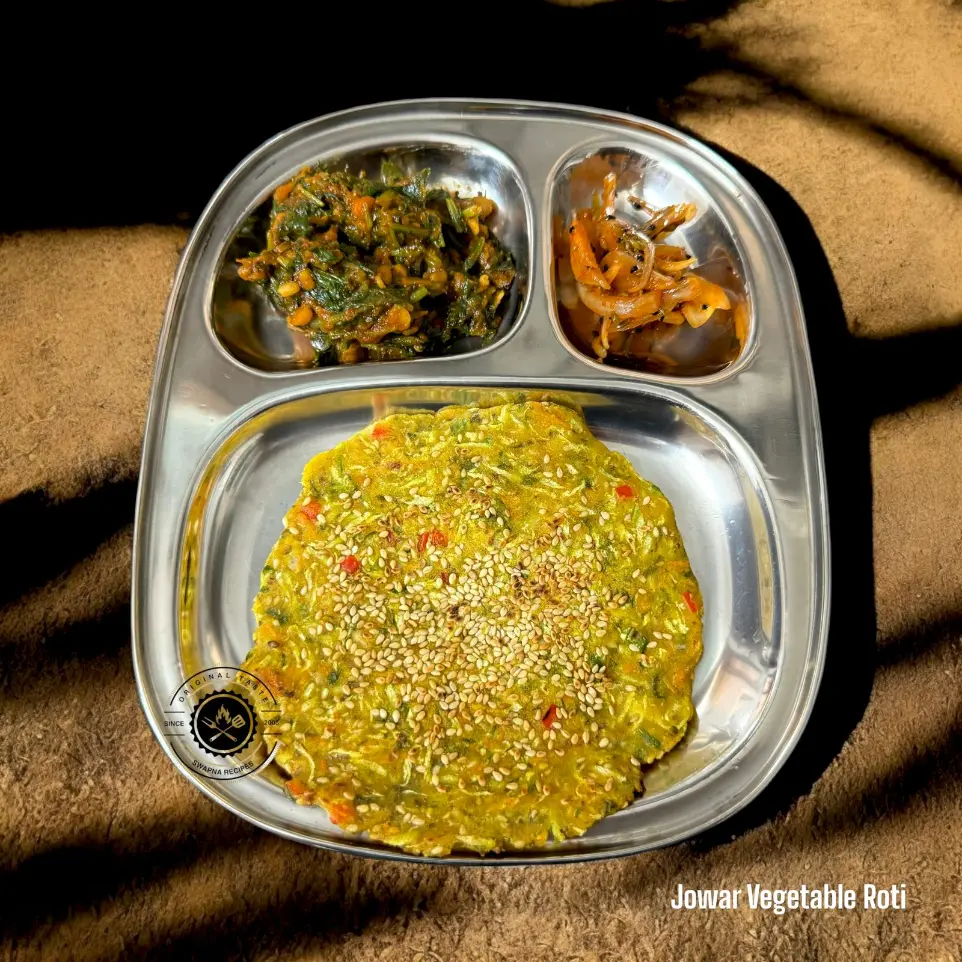 Gluten-Free Jowar Roti with Mixed Vegetables Healthy gluten-free jowar roti made with colorful vegetables, perfect for lunch or dinner with a side of curd.
