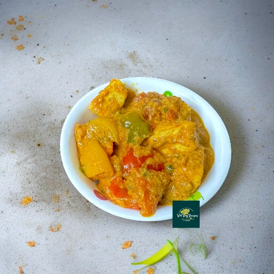 Tricolor Capsicum Paneer Curry with Masala Rich and flavorful curry featuring paneer and tricolor capsicum in a spiced coconut-onion-tomato base.