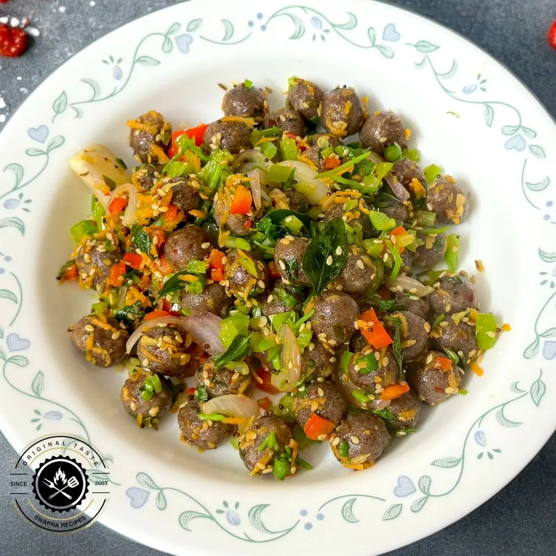 Ragi Paneer Balls Stir-Fry Recipe with Veggies Steamed ragi and paneer balls stir-fried with colorful vegetables and South Indian spices for a healthy lunch or dinner.