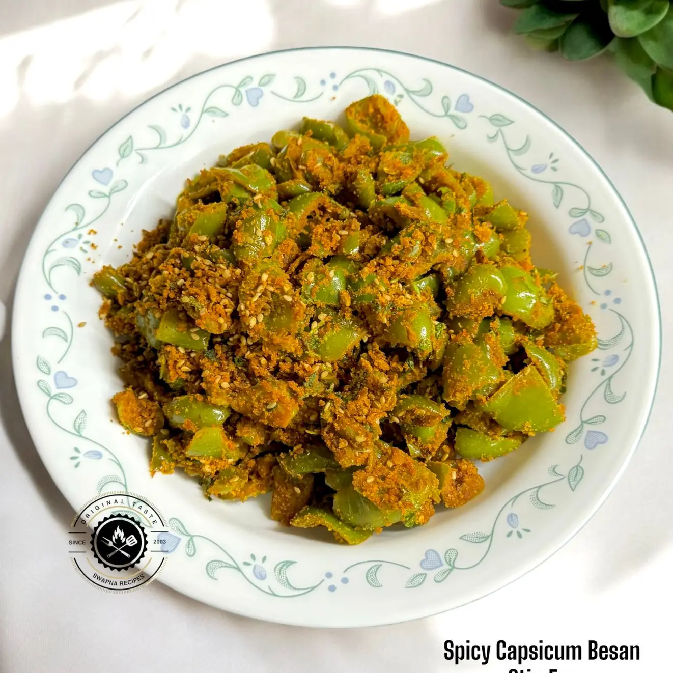 Spicy capsicum and roasted besan stir-fry with sesame and Indian spices – a quick and healthy side dish served with rice or roti.