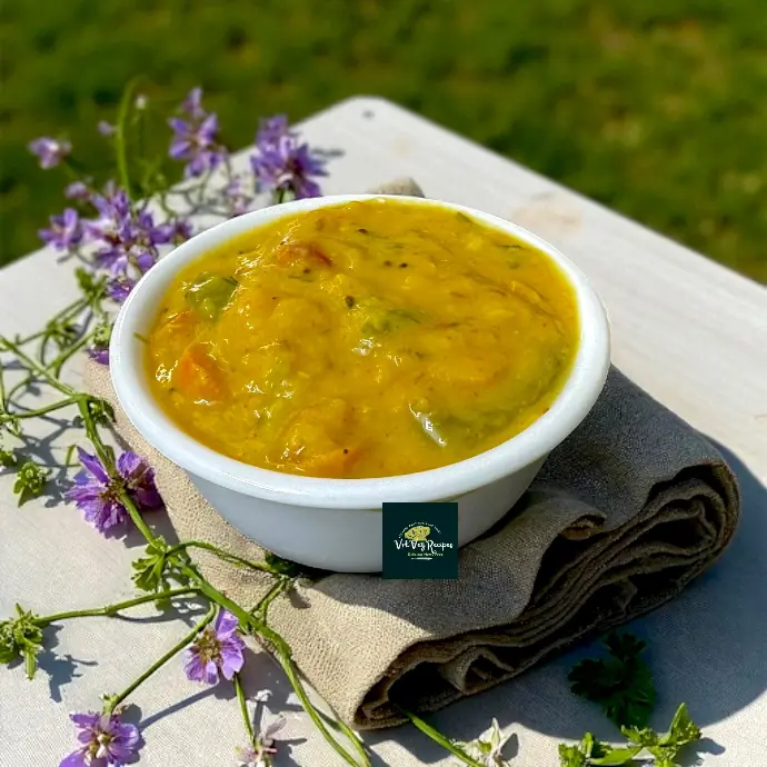 Tangy Vakaya Dal with Toor, Moong & Chana Dals Nutritious vakaya dal recipe featuring mixed dals and tangy carandas, perfect with rice or roti.