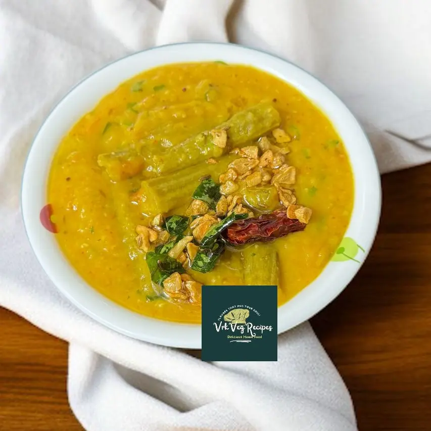 Drumstick dal with garlic tadka served hot with rice, showcasing flavorful South Indian comfort in one hearty dish.