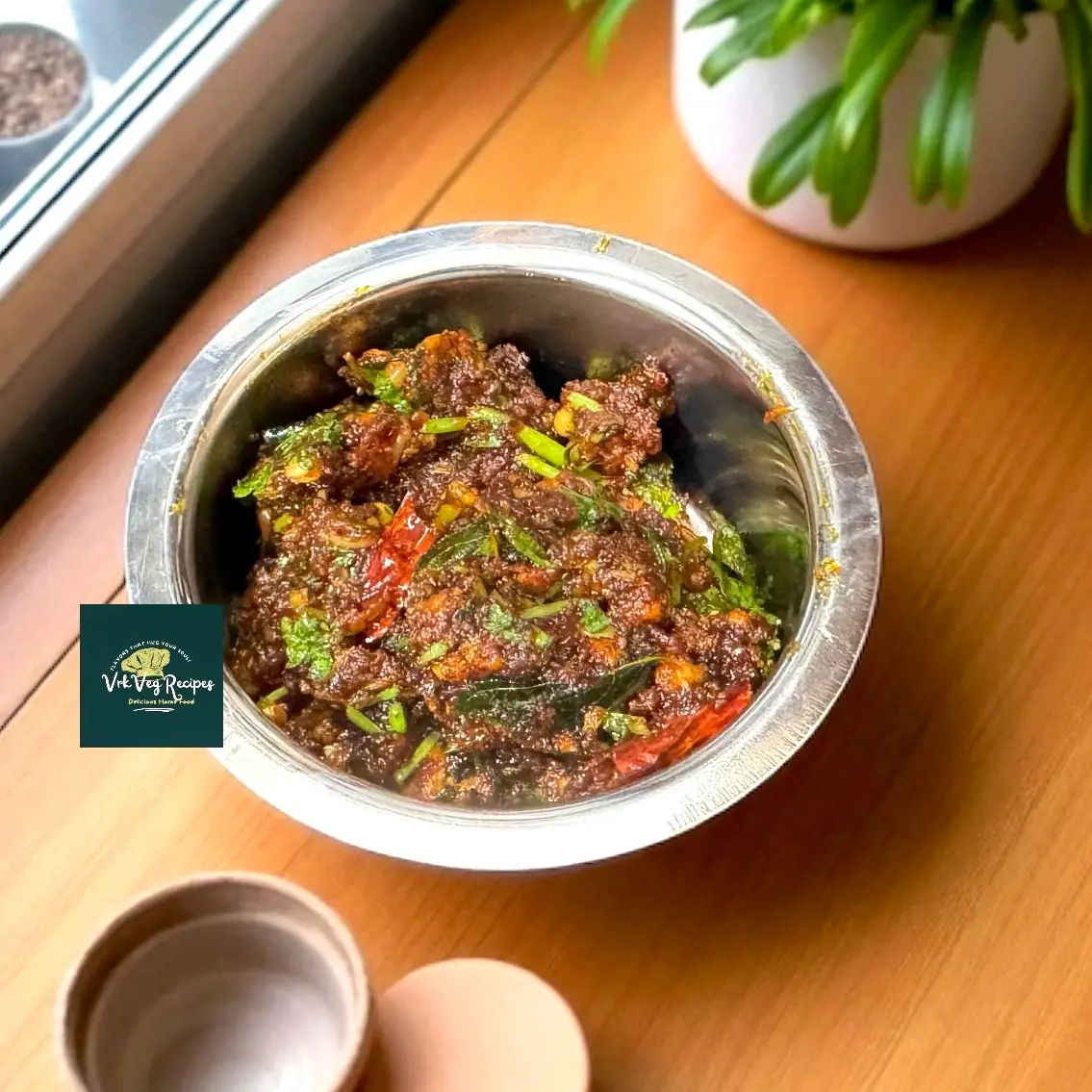 Quick garlic masala tadka with red chillies and mustard seeds, a zingy topping or base for curries and dals.