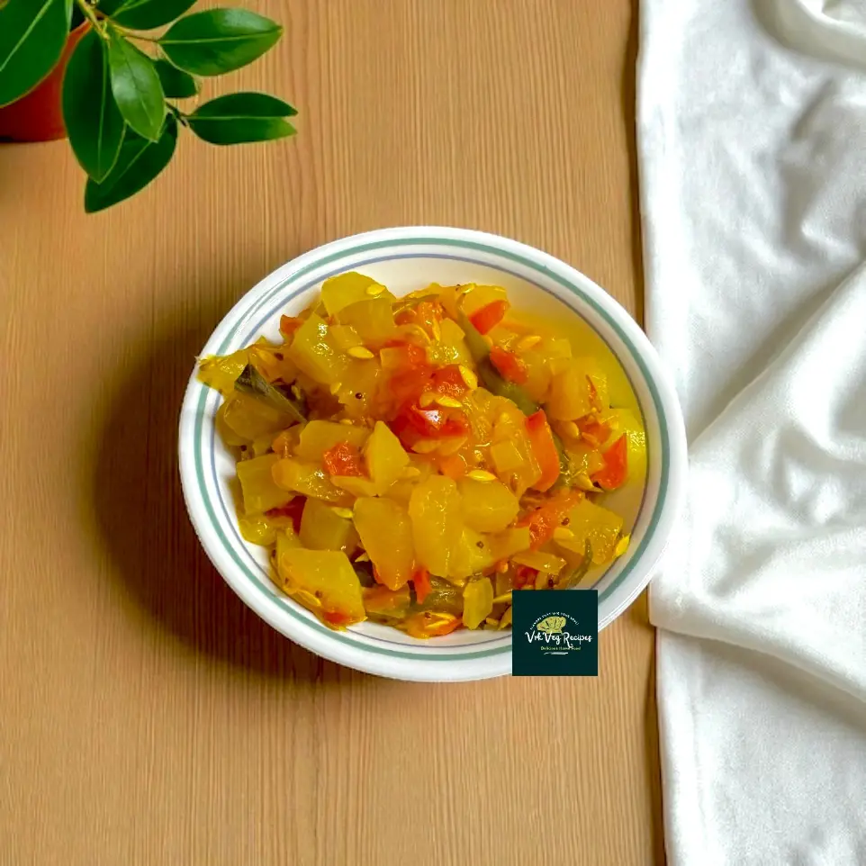 Aromatic dosakaya tomato curry simmered with Indian spices, green chillies, and onions — ideal for a simple South Indian vegetarian meal.
