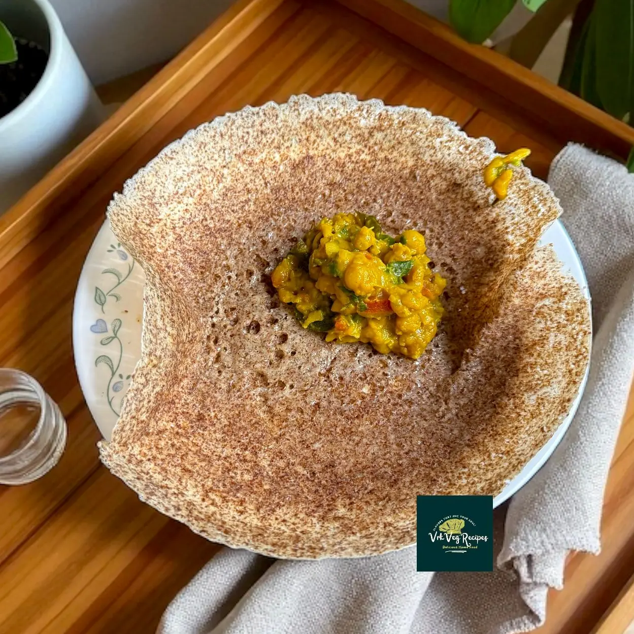 Fluffy Finger Millet Appams with Coconut Lacy finger millet coconut appams made with fermented batter, combining ragi and millet for a wholesome and gluten-free South Indian meal.