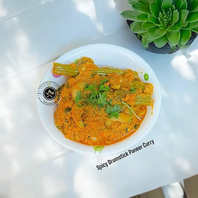 Paneer and drumsticks in a buttery masala curry with bold spices and tomato-cashew gravy. Perfect Indian vegetarian curry for spice lovers.