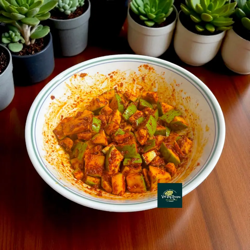 Instant raw mango pickle recipe with red chilli, crushed methi seeds, and oil — traditional taste made simple in just 12 hours.