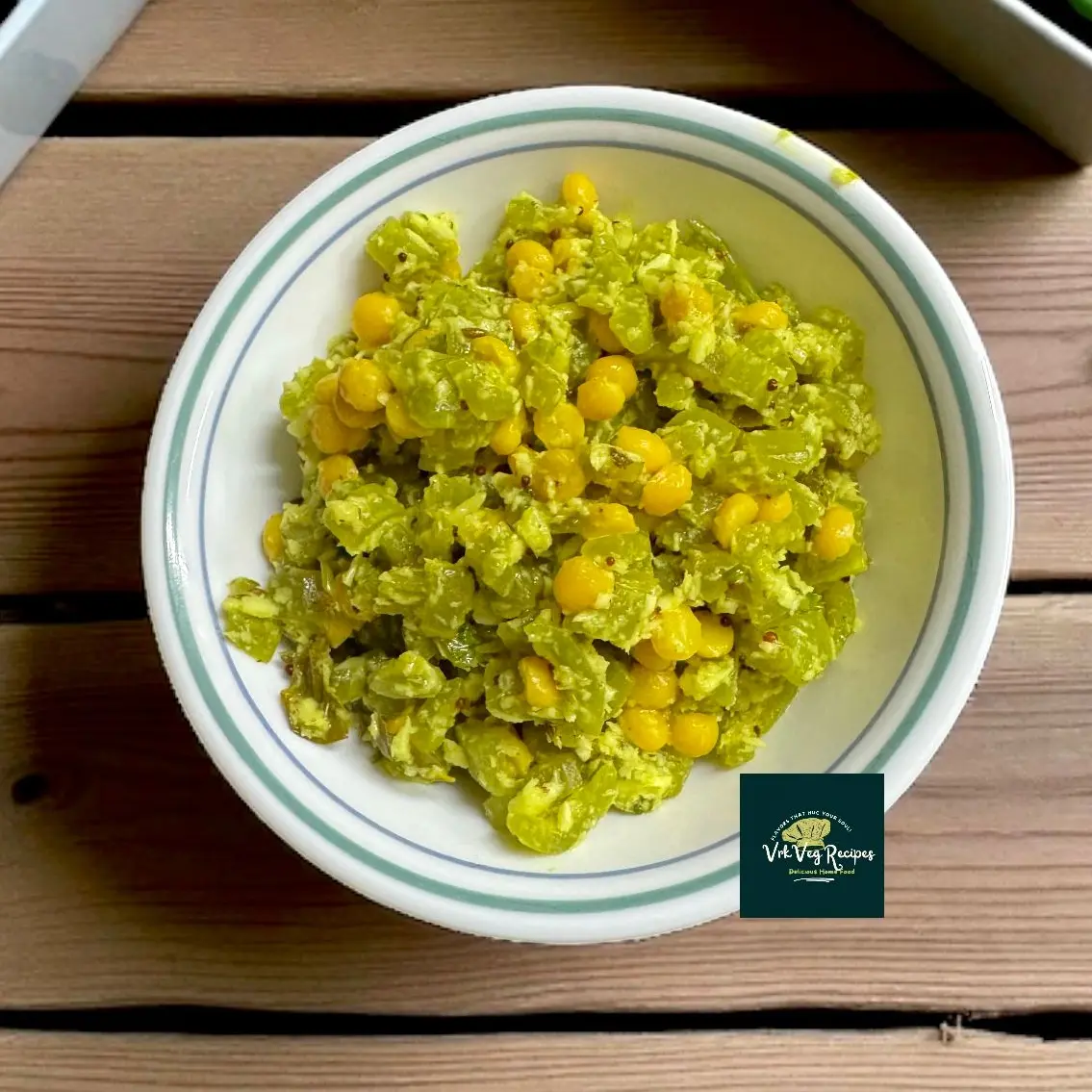 Snake gourd coconut stir-fry with channa dal, flavored with curry leaves, mustard, jeera, and hing – a healthy and tasty South Indian side dish.