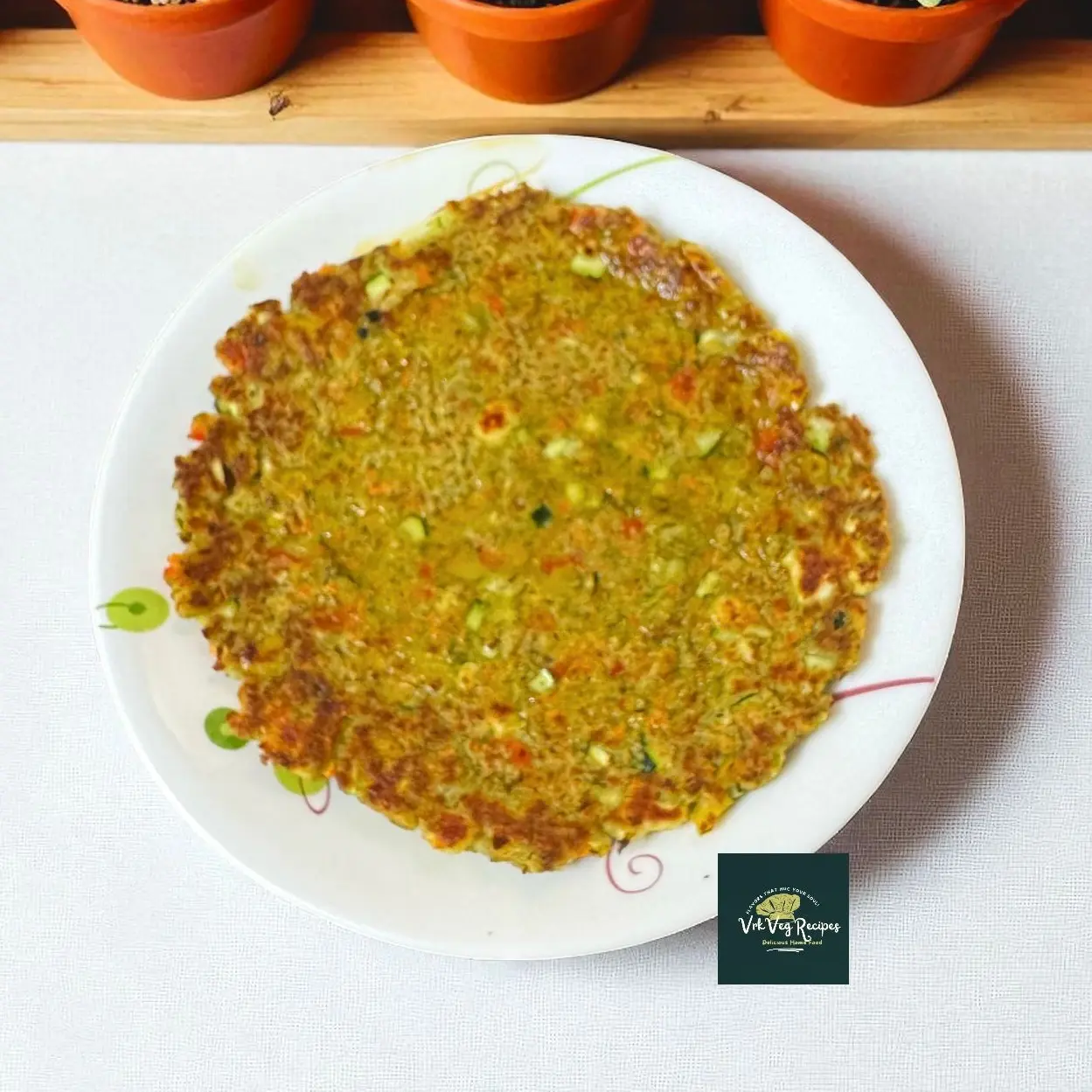 Delicious Moong Dal Veggie Paneer Chilla made with soaked green moong dal, fresh veggies, paneer, spices, and roasted golden for a healthy meal.
