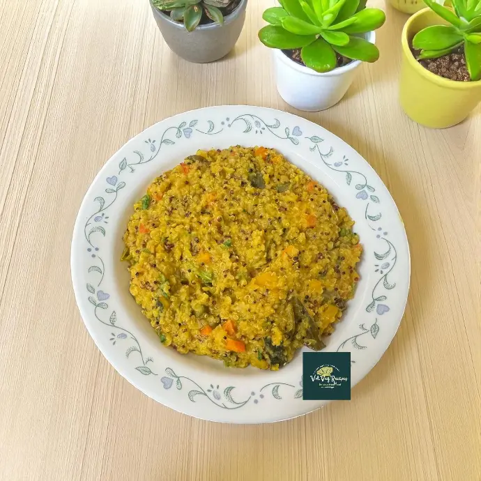Nutritious tricolor quinoa vegetable sambar featuring aromatic spices, protein-rich toor dal, and vibrant veggies in every spoonful.
