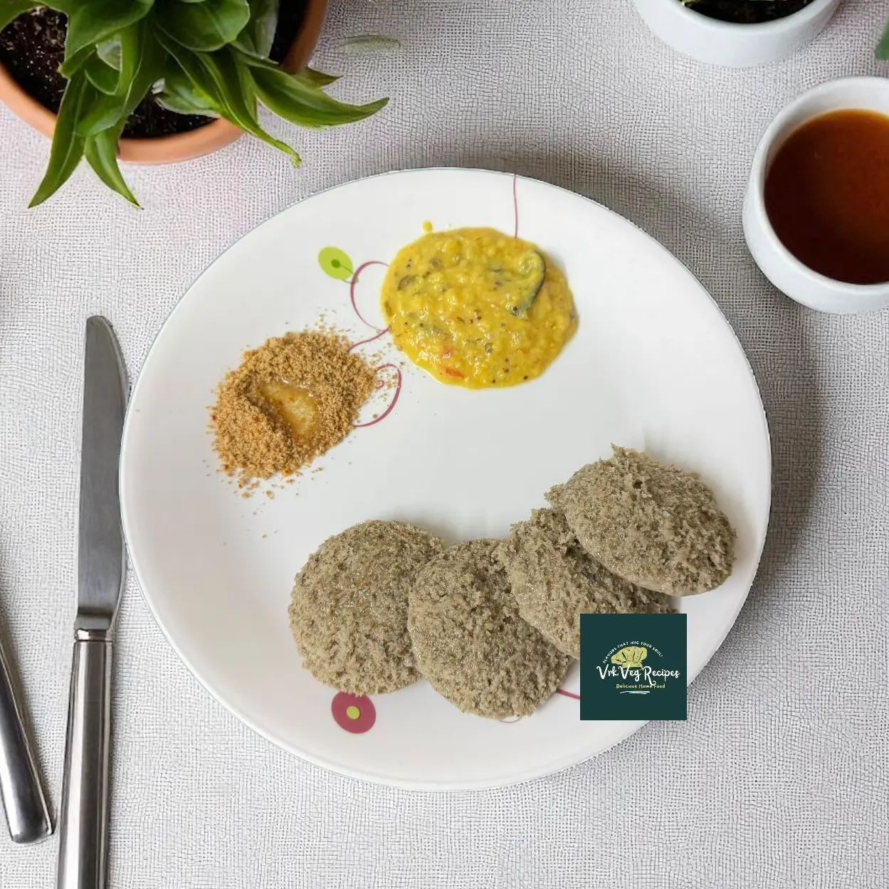 Soft and fluffy Green Moong–Urad Idly served hot with chutney for a wholesome, protein-rich South Indian breakfast or evening snack delight.