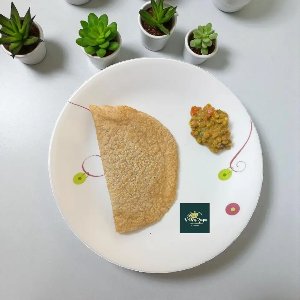 Golden roasted oats roti on a pan, made with oats flour and a hint of oil, offering a nutritious twist to your regular chapati.