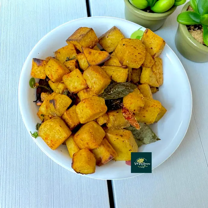 Crispy golden yam fry with garlic, curry leaves, and spices — a spicy and tangy Indian side dish perfect with rice or roti.