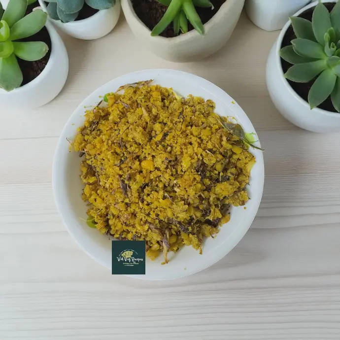 Coarse dal and banana flower stir-fry known as Patoli, cooked with coconut and spices for a wholesome, flavorful meal.